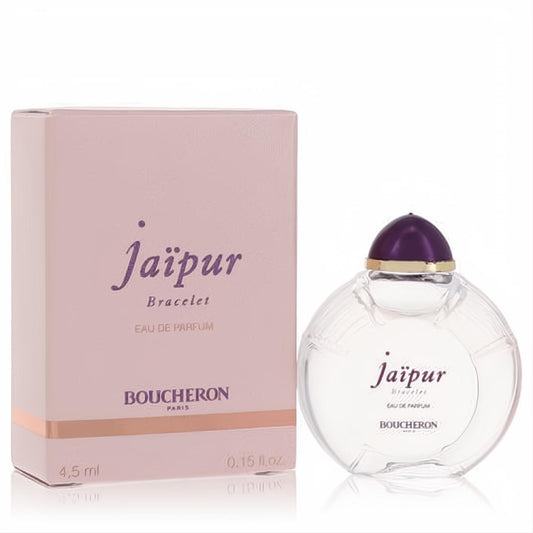Boucheron Jaipur Bracelet .15 oz mini EDP. Elegant pink box and clear round glass bottle with regal purple cap.