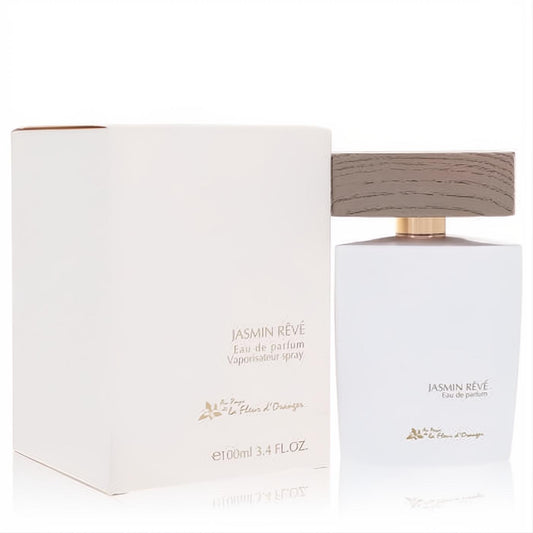 Sleek Jasmin Reve 3.4 oz Eau de Parfum in a white bottle with a gold collar and textured wood cap, next to its elegant box.