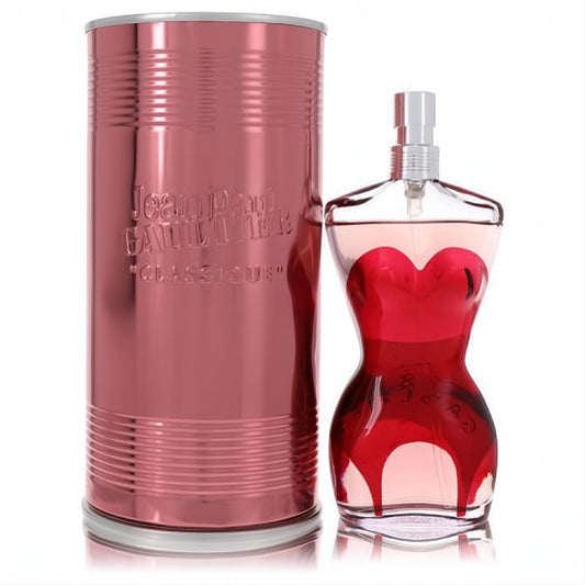 Iconic Jean Paul Gaultier Classique 3.3 oz EDP spray in a stunning red corset torso bottle, beside a luxurious rose gold tin.