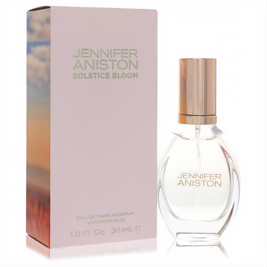 Jennifer Aniston Solstice Bloom 1 oz EDP: elegant clear glass bottle with rose gold cap and soft pink box.
