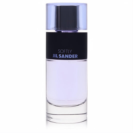 Jil Sander Softly Serene EDP tester. Elegant clear glass bottle with soft lavender liquid, striking black label, and chic purple cap.