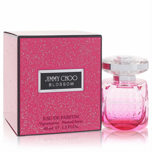 Jimmy Choo Blossom 1.3 oz Eau De Parfum: dazzling pink glitter box and chic faceted glass bottle.