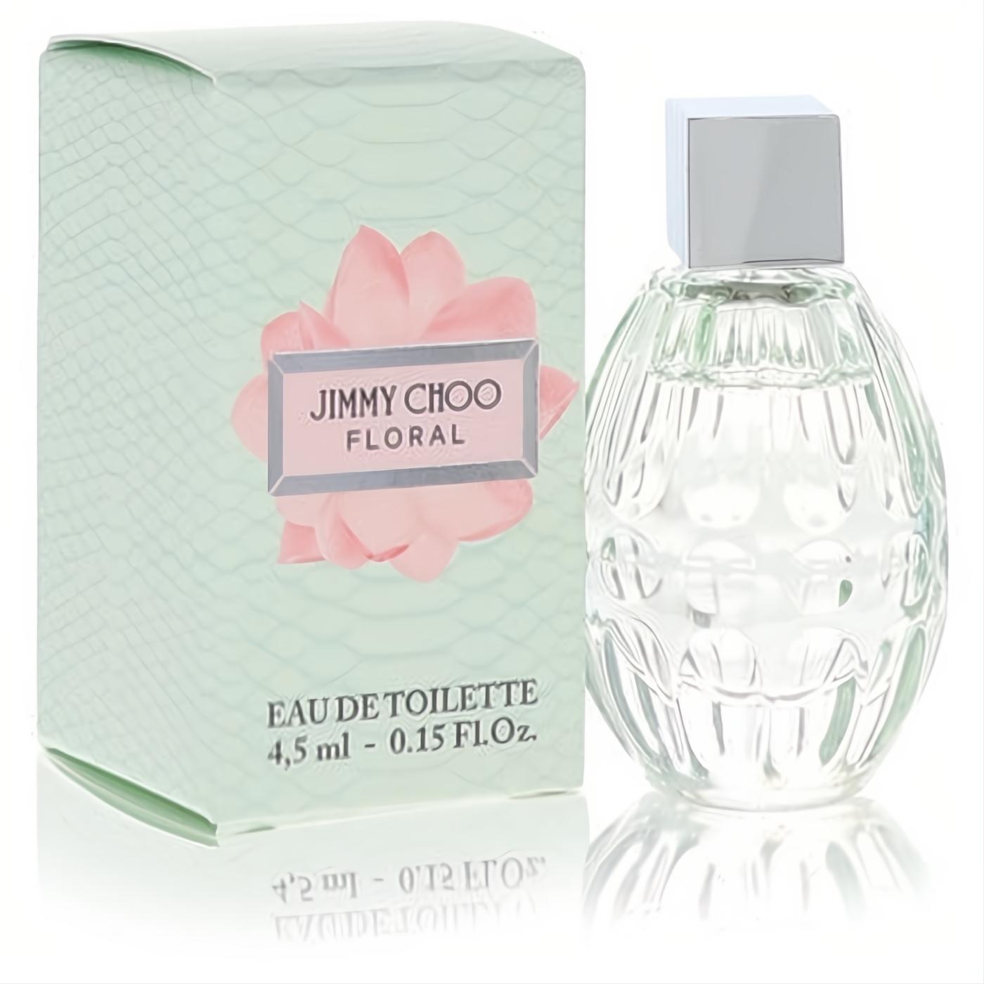 Jimmy Choo Floral mini .15 oz EDT: elegant clear textured bottle with silver cap, beside its chic mint green floral box.
