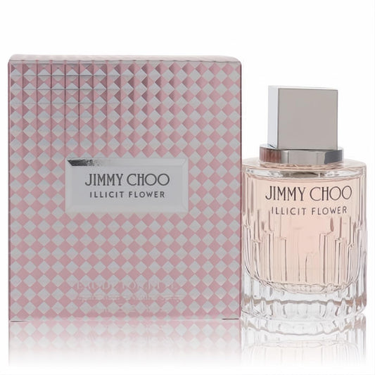 Luxurious Jimmy Choo Illicit Flower 2 oz EDT. Clear textured glass bottle with soft pink fragrance, silver cap, and geometric pink box.