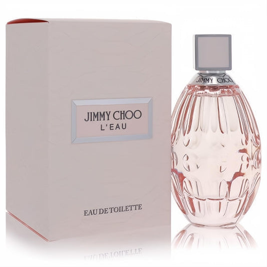 Captivating Jimmy Choo L'eau Eau De Toilette spray. Features an elegant pale pink ribbed glass bottle with a silver cap and matching box.