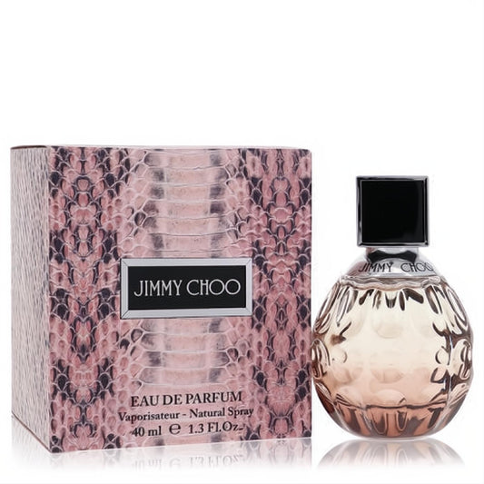 Jimmy Choo Eau De Parfum 1.3 oz women's fragrance. Elegant faceted glass bottle with black cap and chic pink snakeskin box.