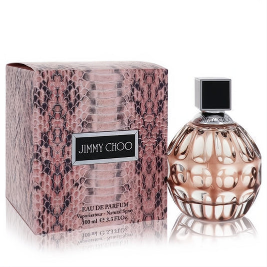 Jimmy Choo Eau De Parfum 3.3 oz. Exquisite faceted rose gold bottle with a striking pink python print gift box.