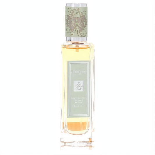 Elegant Jo Malone Lily of The Valley & Ivy cologne spray in a clear glass bottle with a sage green label and decorative floral cap.