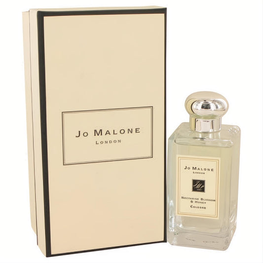 Elegant Jo Malone Nectarine Blossom & Honey 3.4 oz unisex cologne in a clear glass bottle with a sleek silver cap, beside its classic cream and black box.
