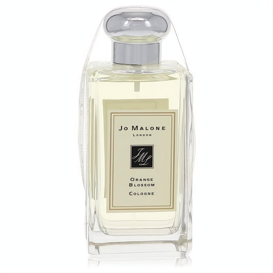 Elevate your scent with Jo Malone Orange Blossom cologne: a sleek clear glass bottle, silver cap, and elegant cream label.