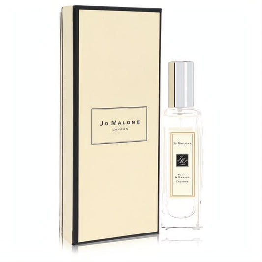 Elegant Jo Malone Poppy & Barley 1 oz unisex cologne spray in a clear glass bottle with silver cap, beside its signature cream box.