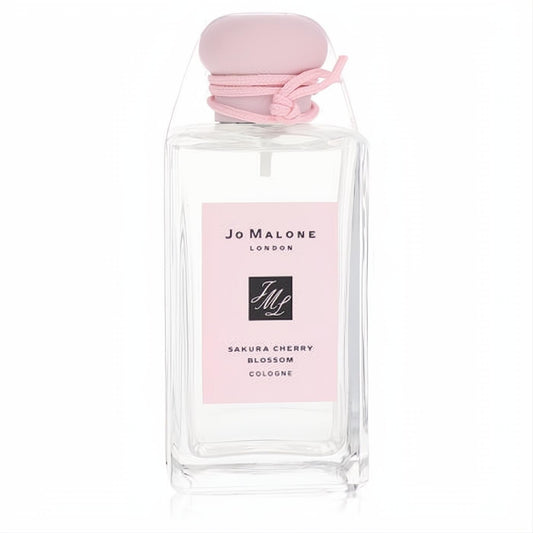 Jo Malone Sakura Cherry Blossom 3.4 oz cologne in a sleek glass bottle with a soft pink cap, label, and tie.