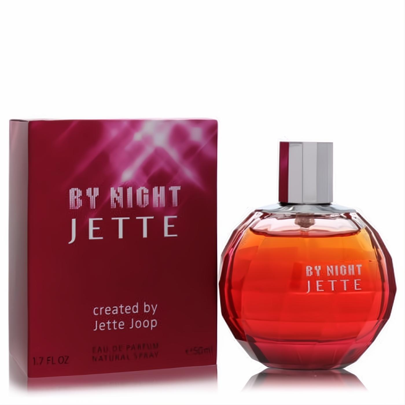 Elegant Joop Jette Night 1.7 oz Eau De Parfum. Vibrant red faceted bottle, sleek silver cap, and matching branded box.