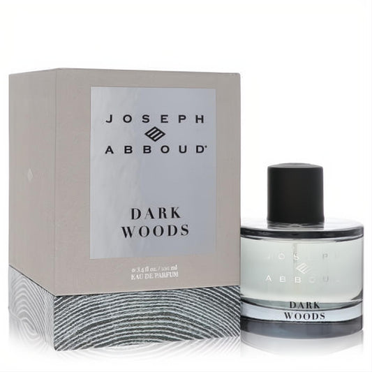 Joseph Abboud Dark Woods 3.4 oz Eau De Parfum for men. Elegant clear glass bottle, black cap, and stylish grey box.