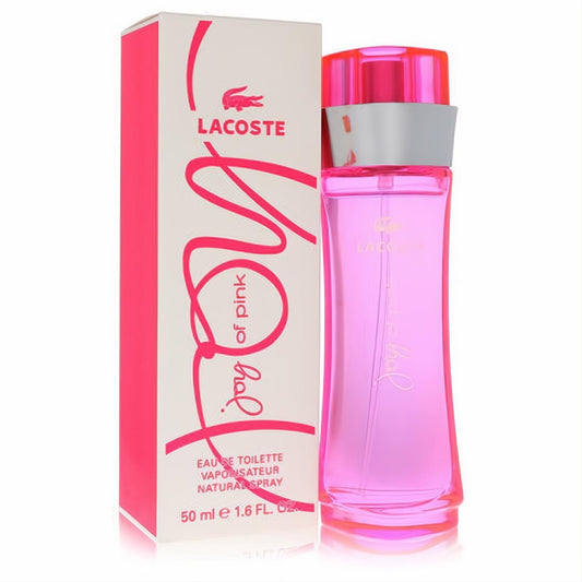 Vibrant pink Lacoste Joy Of Pink Eau De Toilette spray, 1.6 oz, in an elegantly curved glass bottle with iconic crocodile logo box.