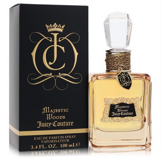 Luxurious Juicy Couture Majestic Woods 3.4 oz EDP spray. Elegant clear bottle with golden liquid, faceted crystal cap, and ornate gold accents.