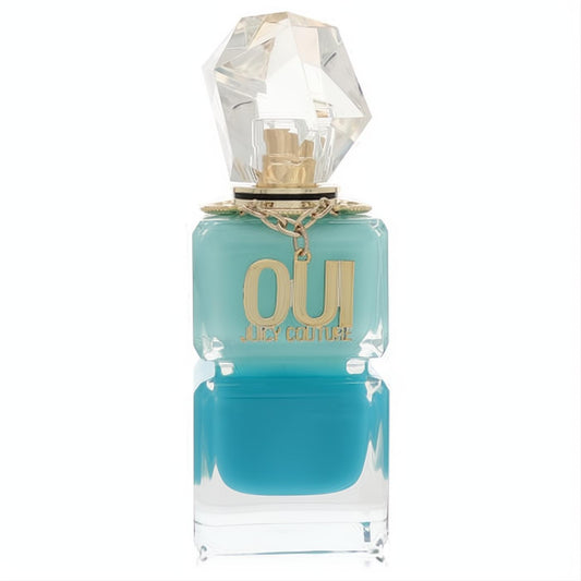 Juicy Couture Oui Splash 3.4 oz perfume bottle. Features a dazzling faceted crystal cap, gold chain, and vibrant two-tone blue liquid.