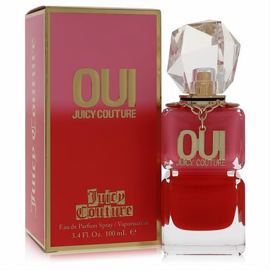 Juicy Couture Oui 3.4 oz Eau De Parfum bottle, vibrant red with a faceted cap and gold accents, next to its gradient red-pink box.