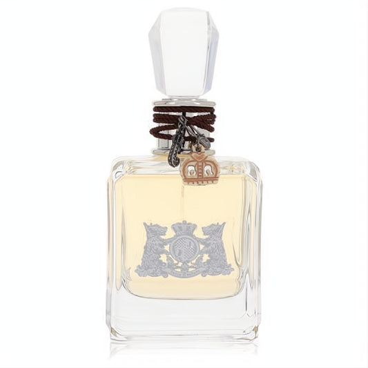 Elegant Juicy Couture perfume bottle. Clear glass, faceted cap, brown braided cord, and iconic silver crest.