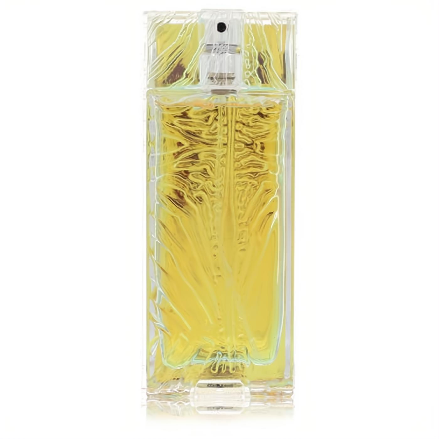 Unveil Just Cavalli Pink 2 oz tester EDT. Distinctive clear glass bottle with golden liquid and unique textured design.