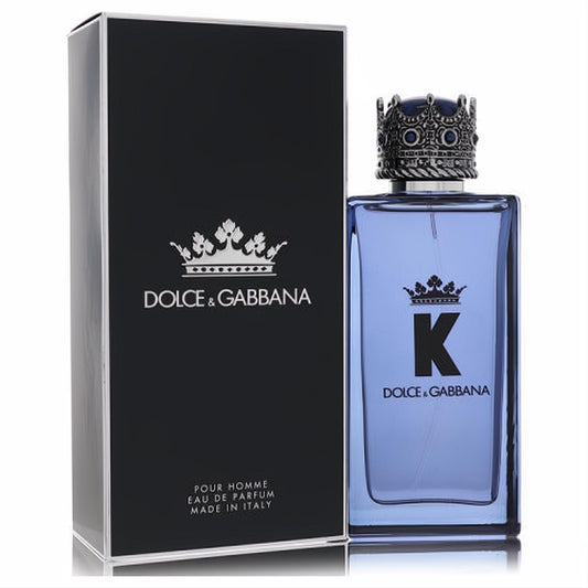 Experience K by Dolce & Gabbana men's Eau de Parfum. Iconic blue bottle with a regal silver crown cap and elegant black box.