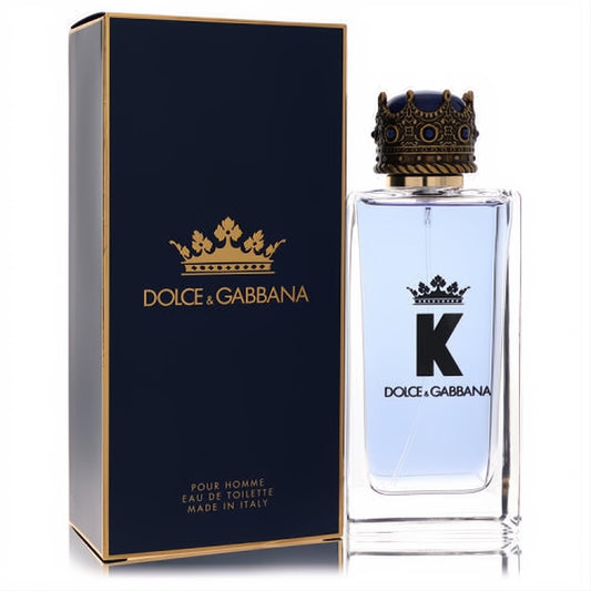 K by Dolce & Gabbana men's 3.4 oz Eau De Toilette. Clear bottle with light blue liquid, ornate gold crown cap, and dark blue box.