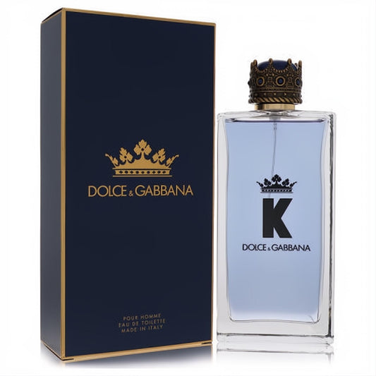 K by Dolce & Gabbana men's EDT. Clear bottle with light blue fragrance, iconic 'K' logo, regal gold crown cap, and matching navy box.