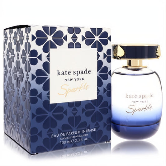 Kate Spade Sparkle Eau De Parfum Intense 3.3 oz. Luxurious blue ombre glass bottle with gold cap, beside its elegant floral pattern box.