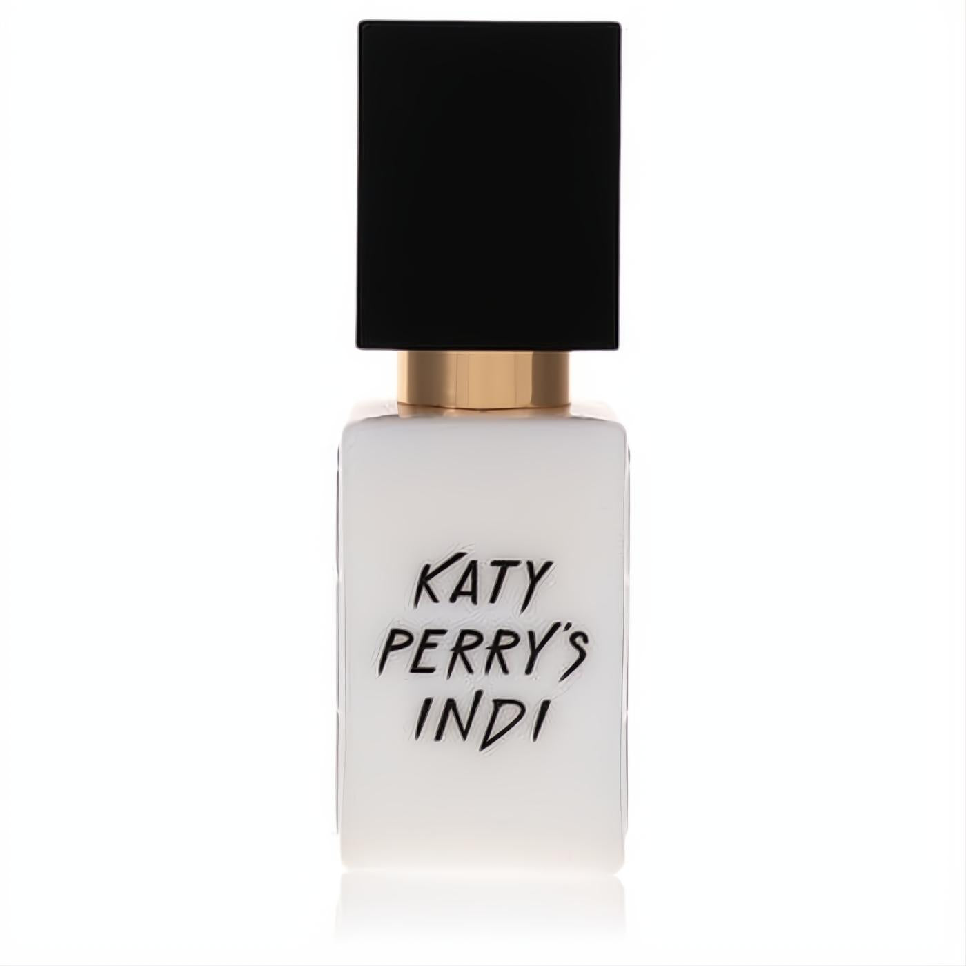 Katy Perry's Indi .33 oz mini EDP spray. Chic frosted white bottle, bold black cap, and luxurious gold band.