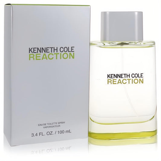 Kenneth Cole Reaction 3.4 oz men's Eau De Toilette. Modern clear glass bottle with silver cap, vibrant green liquid, and sleek grey box.