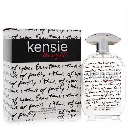 Kensie Loving Life 3.4 oz Eau De Parfum. Clear oval bottle with silver cap and unique handwritten text, displayed with its matching white box.