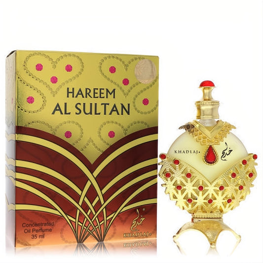 Exquisite Khadlaj Hareem Al Sultan Gold 35ml concentrated perfume oil. Ornate gold bottle with red gems, beside its luxurious gold & maroon box.