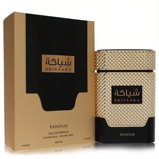 Khadlaj Shiyaaka Gold 3.4 oz Eau de Parfum. Striking textured gold and black bottle with elegant branding and matching box.