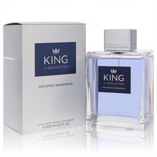 Antonio Banderas King of Seduction Men's EDT 6.8 oz. Elegant clear bottle with captivating blue fragrance and sleek silver cap.