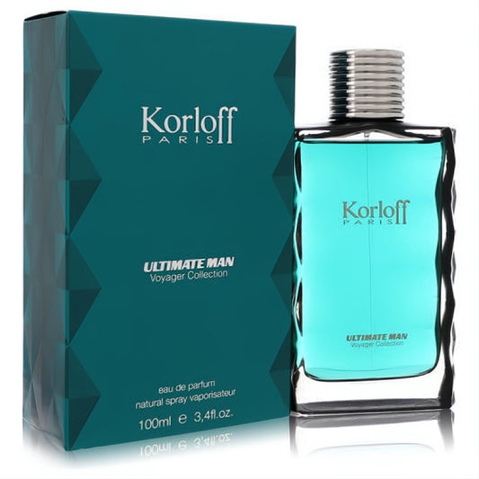 Korloff Ultimate Man 3.4 oz EDP. Sleek rectangular glass bottle with invigorating blue fragrance, silver cap, and teal box.