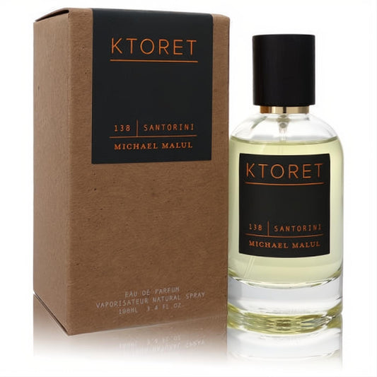Ktoret 138 Santorini 3.4 oz men's EDP. Golden fragrance in a sleek clear bottle with black cap and elegant kraft box.