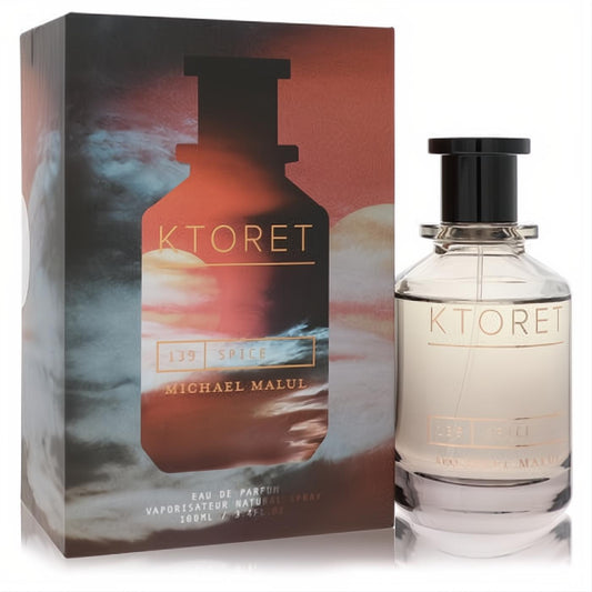 Ktoret 139 Spice Michael Malul 3.4 oz EDP. Sophisticated clear glass bottle, black cap, and bold cosmic-themed box.