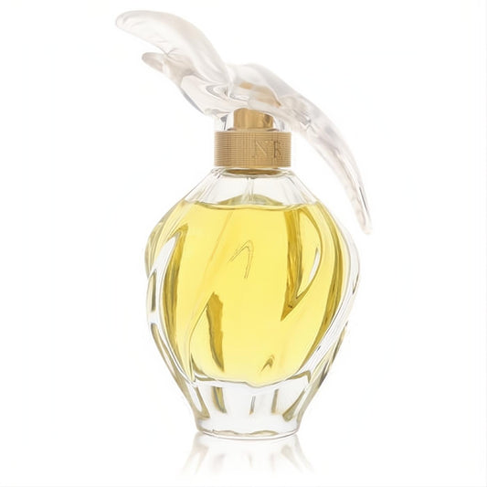 L'Air Du Temps Nina Ricci Eau De Parfum. Refined twisted glass bottle, golden liquid, and iconic clear dove cap.