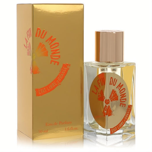 Luxurious La Fin Du Monde 1.6 oz unisex Eau De Parfum. Clear glass bottle with gold cap and vibrant orange branding, next to its matching gold box.