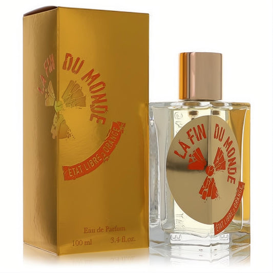 Luxurious La Fin Du Monde 3.4 oz unisex EDP by Etat Libre d'Orange. Clear bottle with striking gold label, beside its metallic gold box.