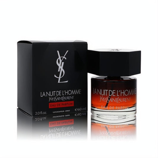 Yves Saint Laurent La Nuit De L'Homme 2 oz Eau De Parfum. Elegant dark amber bottle, black hexagonal cap, and matching black YSL logo box.