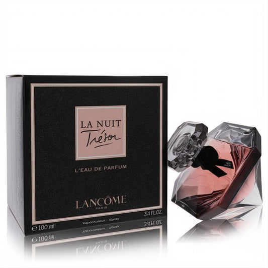Luxurious Lancome La Nuit Tresor 3.4 oz L'eau De Parfum. Diamond-cut bottle with pink liquid, black ribbon, and elegant black box.