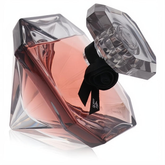 Luxurious Lancome La Nuit Tresor women's perfume: a faceted diamond bottle with rose-gold liquid and black rose.