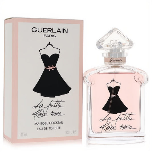 Elegant Guerlain La Petite Robe Noire 3.4 oz EDT. Chic pink box and clear glass bottle with rose-tinted fragrance and iconic dress design.