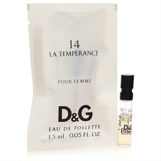 D&G La Tempérance 14 women's fragrance sample: clear glass vial with black cap, nestled in a frosted white 0.05 oz sachet.