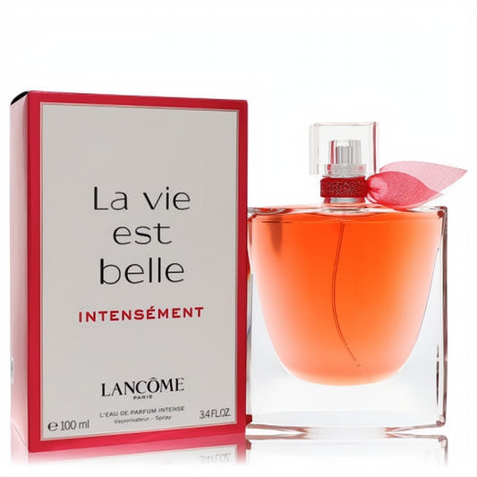 Lancome La Vie Est Belle Intensement 3.4 oz EDP. Captivating coral fragrance in an elegant glass bottle with a chic red ribbon.
