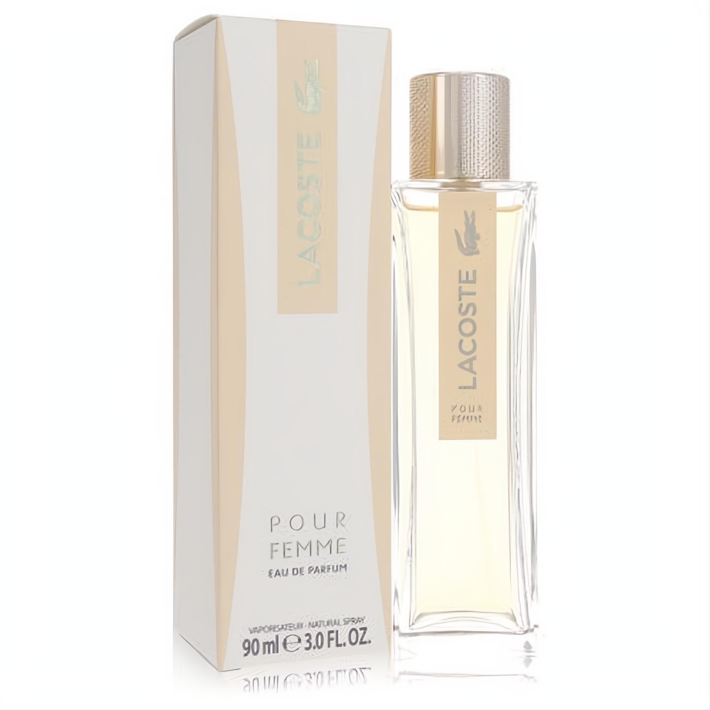 Luxurious Lacoste Pour Femme 3 oz Eau De Parfum spray. Clear rectangular bottle with gold cap and elegant white box.