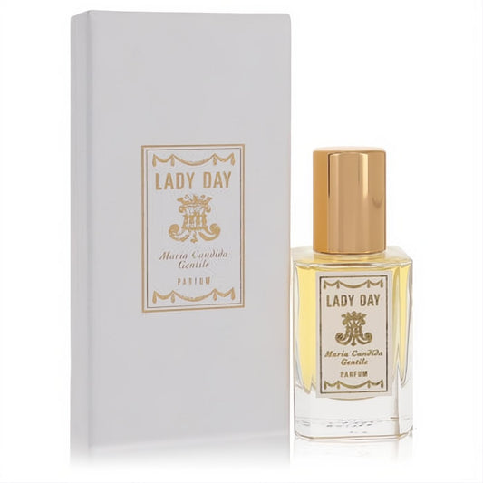 Lady Day Maria Candida Gentile pure perfume in a clear glass bottle with a gold cap, next to its matching white and gold box.