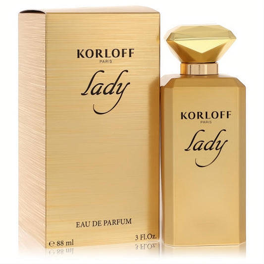 Lady Korloff Eau De Parfum 3.0 oz. Luxurious gold bottle with a sparkling diamond-cut cap and elegant striped box.