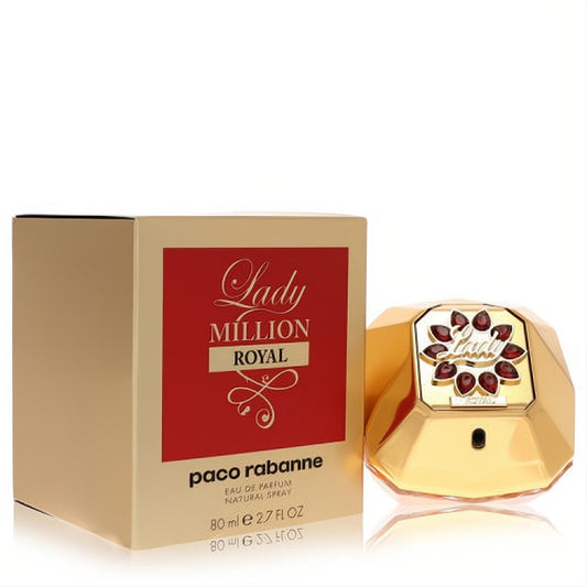 Paco Rabanne Lady Million Royal 2.7 oz EDP. Dazzling gold diamond bottle with red gems, beside its vibrant red and gold box.